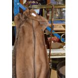 FUR COAT & SILVER MOUNTED CANE