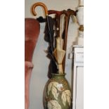 LARGE POTTERY VASE, VARIOUS STICKS & UMBRELLAS