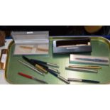 TRAY CONTAINING ASSORTED PENS