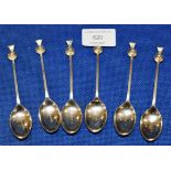 A SET OF STERLING SILVER TEASPOONS, THE TERMINALS WITH A STYLISED THISTLE FINIAL, WITH BIRMINGHAM