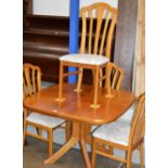 TEAK TABLE WITH 4 MATCHING CHAIRS