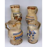 Quattro brocche in maiolica smaltata - Four enameled majolica jugs