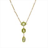 An Edwardian peridot and seed pearl set pendant necklace