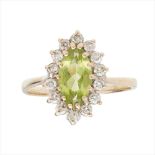 A peridot and diamond set cluster ring