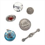 A collection of mainly Scottish silver and agate set brooches