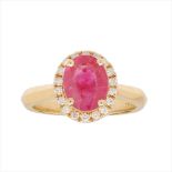An 18ct gold ruby and diamond set cluster ring
