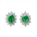 A pair of jade and diamond set cluster earrings