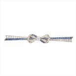 An early 20th century diamond and sapphire set bar brooch