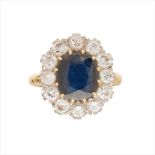 An 18ct sapphire and diamond set cluster ring