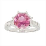 A pink topaz and diamond set cluster ring
