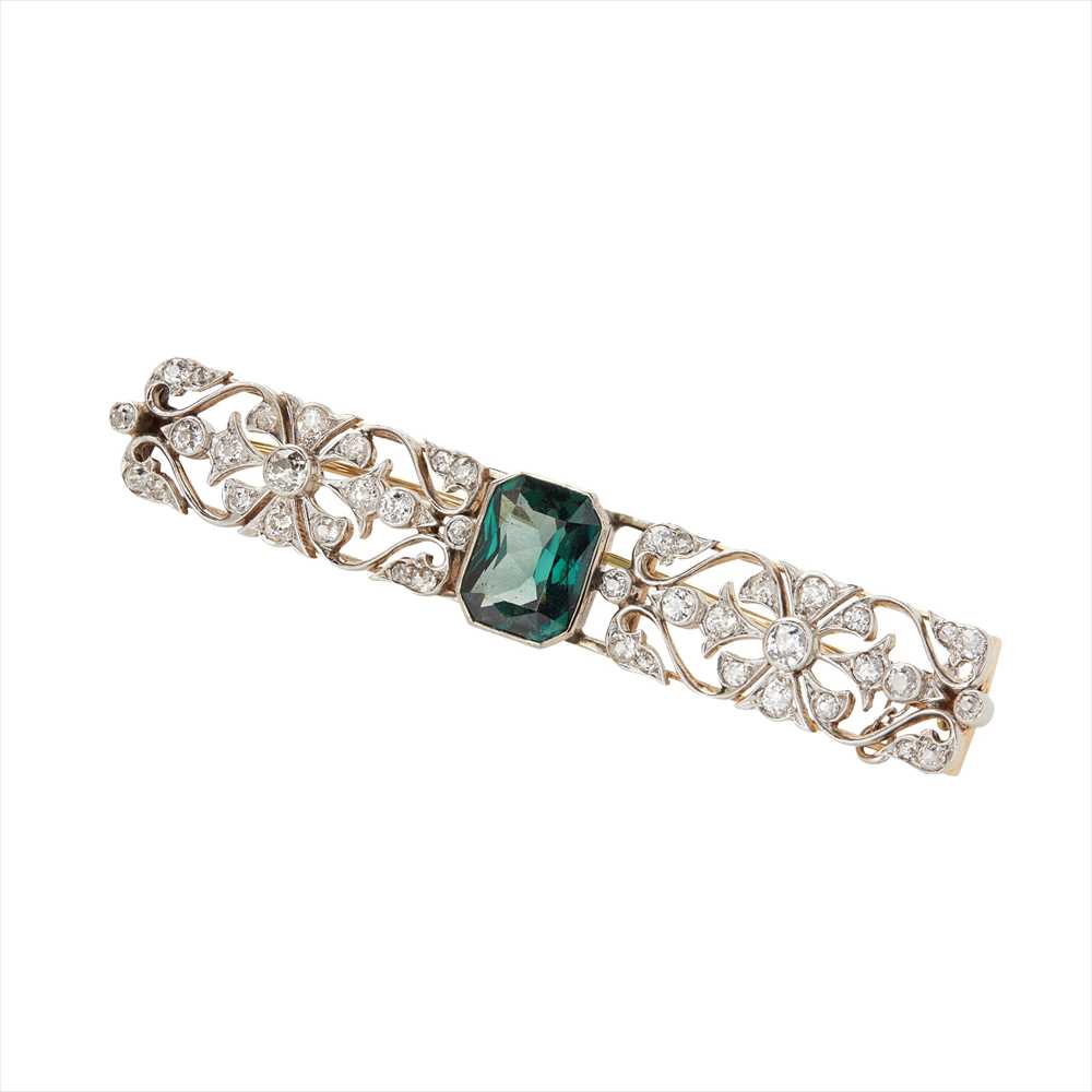 A green spinel and diamond set bar brooch