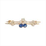 A sapphire and diamond set pansy brooch