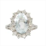 An aquamarine and diamond set cluster ring