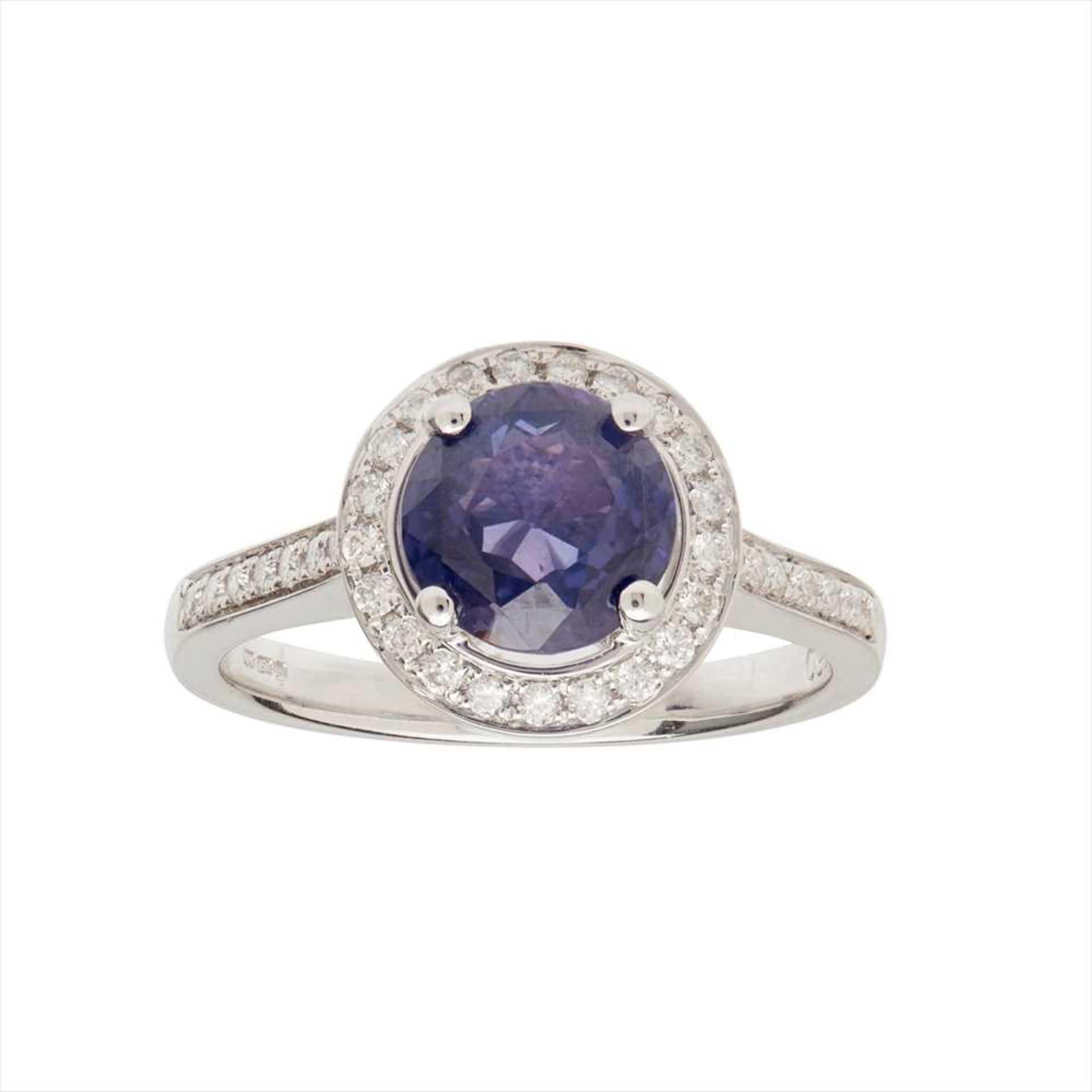 A purple sapphire and diamond set ring