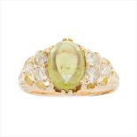 A demantoid garnet and diamond set ring