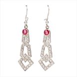 A pair of ruby and diamond set pendant earrings