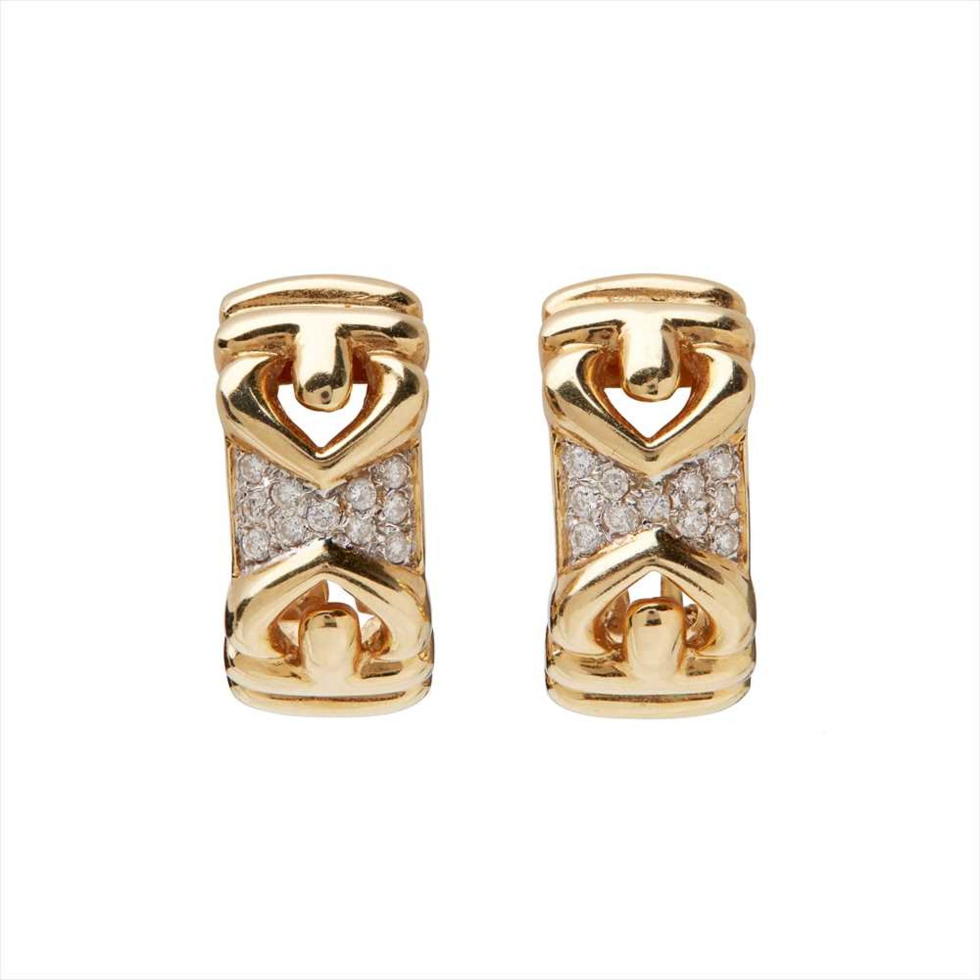 A pair of diamond set earrings