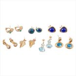 A collection of gem set earrings