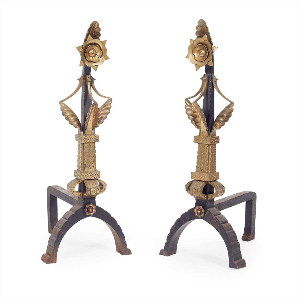 MANNER OF CHRISTOPHER DRESSER PAIR OF AESTHETIC MOVEMENT BRASS AND CAST IRON FIRE DOGS, CIRCA 1880