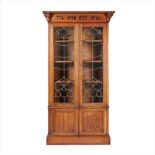 LIBERTY & CO., LONDON ARTS & CRAFTS OAK BOOKCASE, CIRCA 1910