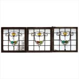 SCOTTISH SCHOOL IN THE MANNER OF OSCAR PATERSON SUITE OF STAINED AND LEADED GLASS PANELS, CIRCA