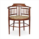 MANNER OF E. W. GODWIN AESTHETIC MOVEMENT MAHOGANY TUB CHAIR, CIRCA 1890