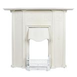 MANNER OF M. H. BAILLIE-SCOTT CAST IRON FIREPLACE AND SURROUND, CIRCA 1900