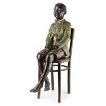 FRIEDRICH GOLDSCHEIDER (1845–1897) LARGE AUSTRIAN POLYCHROME FIGURE OF A SEATED BOY, CIRCA 1900