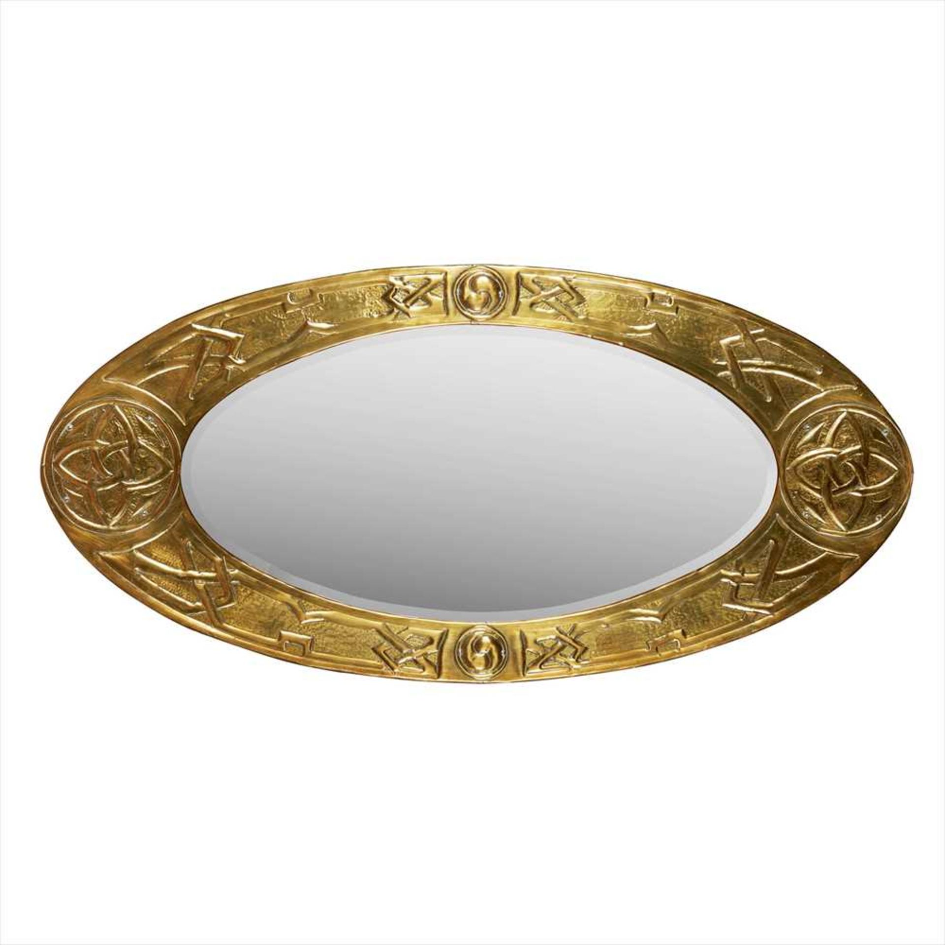 SCOTTISH SCHOOL CELTIC REVIVAL BRASS WALL MIRROR, CIRCA 1920