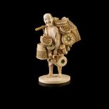 Y JAPANESE IVORY 'STREET VENDOR' OKIMONO MEIJI PERIOD