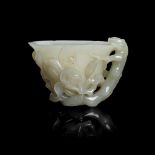 CELADON JADE 'MAGNOLIA' CUP QING DYNASTY, 18TH-19TH CENTURY