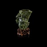 SPINACH-GREEN JADE 'CRANE AND PINE TREE' VASE QING DYNASTY, 19TH CENTURY