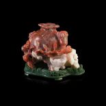 CARNELIAN CARVING OF A POMEGRANATE LATE QING DYNASTY-REPUBLIC PERIOD, 19TH-20TH CENTURY