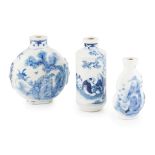 GROUP OF THREE BLUE AND WHITE SNUFF BOTTLES QING DYNASTY, 19TH CENTURY