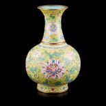 RARE IMPERIAL PAINTED ENAMEL YELLOW-GROUND 'LOTUS' VASE QIANLONG MARK AND PERIOD
