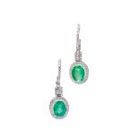 A pair of emerald and diamond set pendant earrings