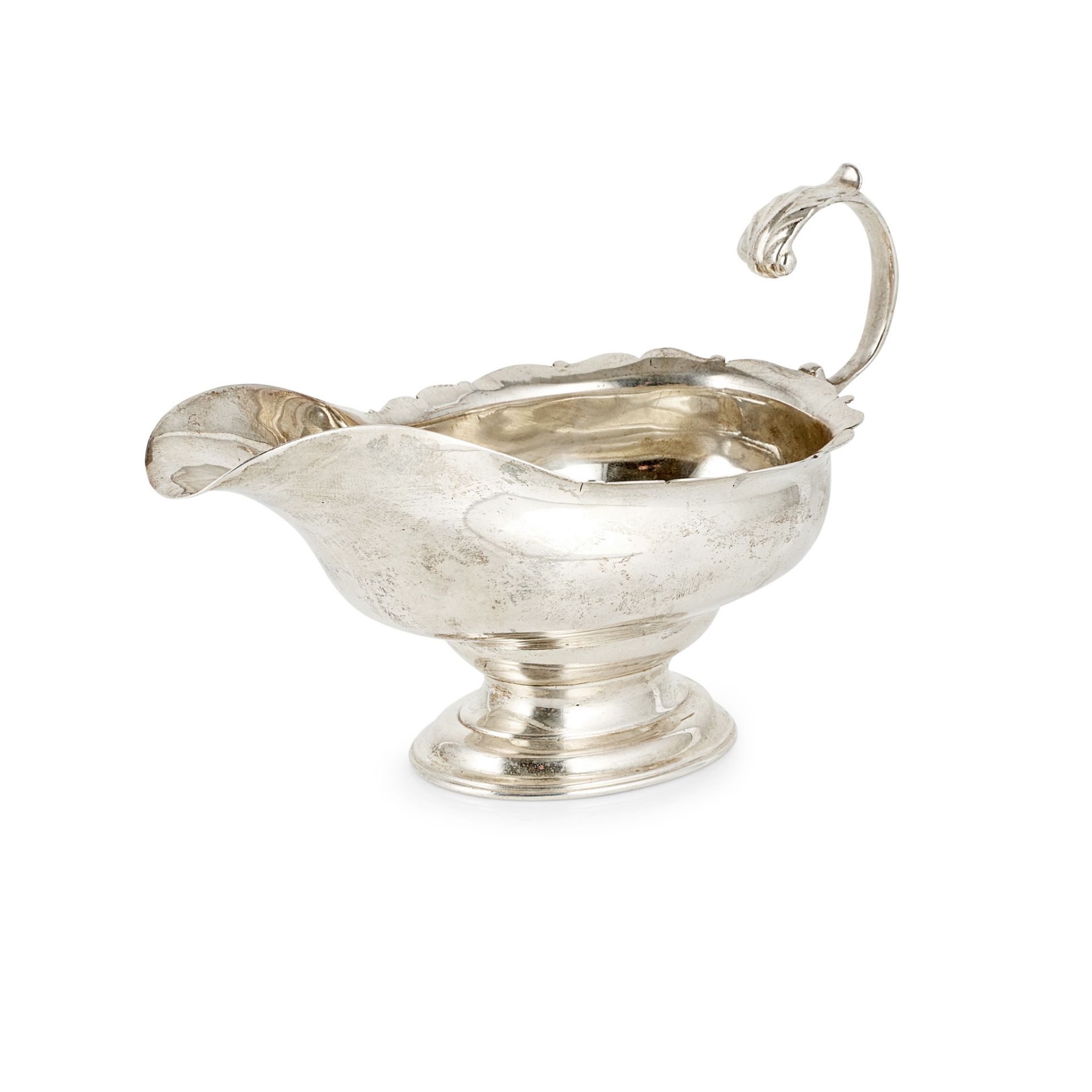 A George III Scottish silver sauce boat