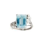 An aquamarine and diamond set ring