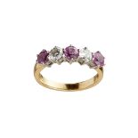 A pink sapphire and diamond set five stone ring