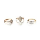 A collection of three diamond set rings