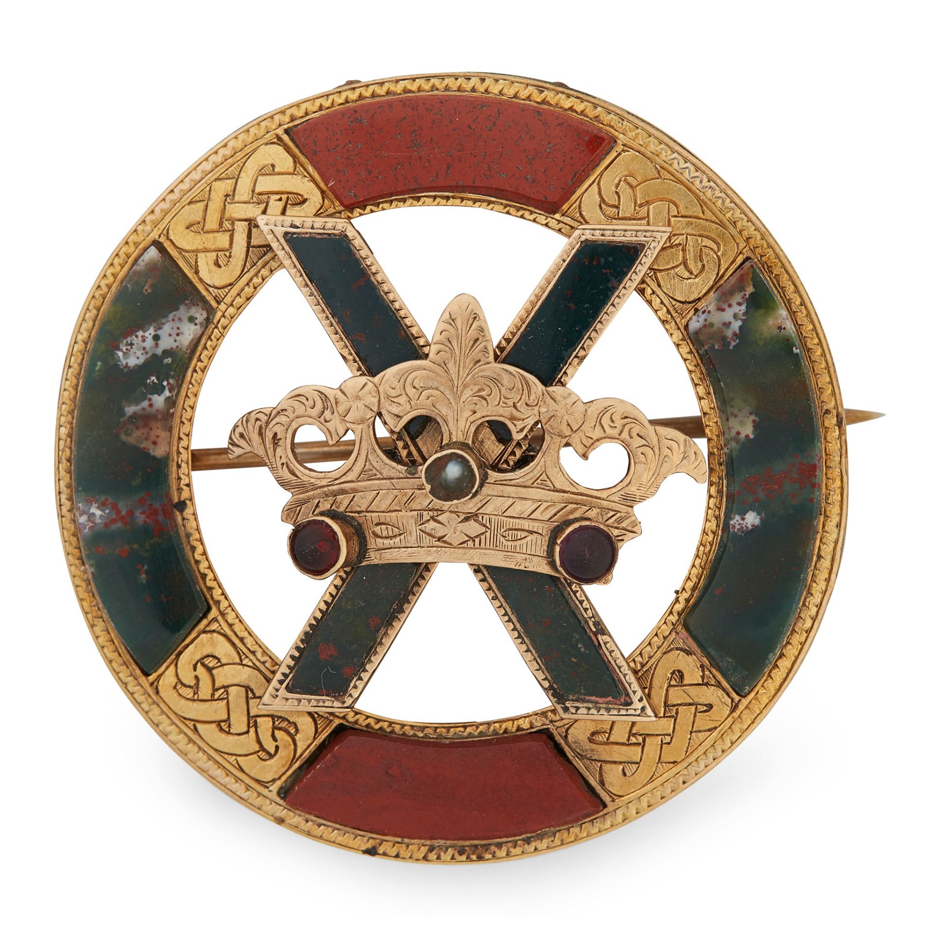 A SCOTTISH GOLD MOUNTED HARD STONE BROOCH