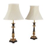 PAIR OF REGENCY PATINATED AND GILT BRONZE LAMPS 19TH CENTURY