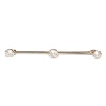 A diamond set bar brooch