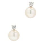 A pair of pearl and diamond set earrings