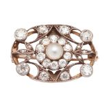 A pearl and diamond set brooch