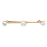 A diamond set bar brooch