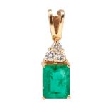 An emerald and diamond set pendant