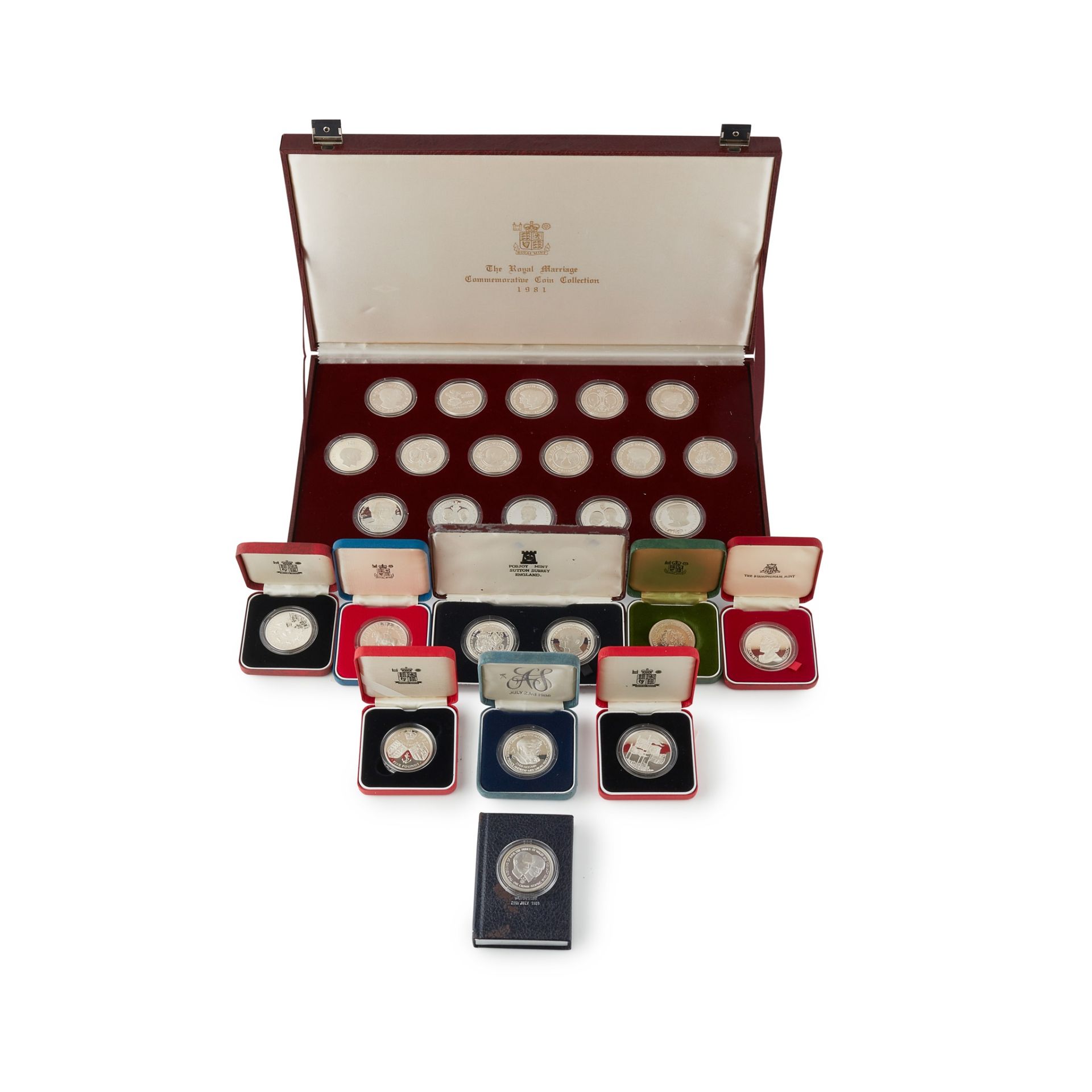 A collection of cased modern proof silver and other coins