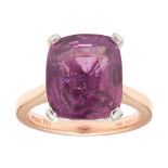 A pink sapphire set ring