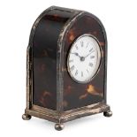 An Edwardian silver cased small clock